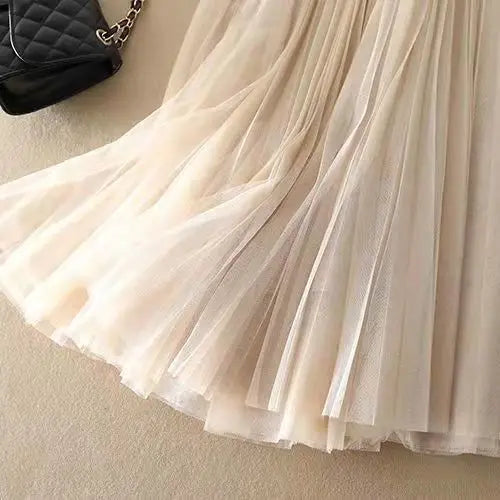 Elegant Pleated Skirt | High-Waisted Design with Flowing Mesh Layers | Effortless Style for Any Occasion